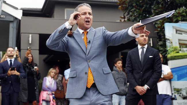 Auctioneer James Keenan goes for the gavel as he sells a home in Sydney’s North Bondi for $6.1m Picture: Sam Ruttyn