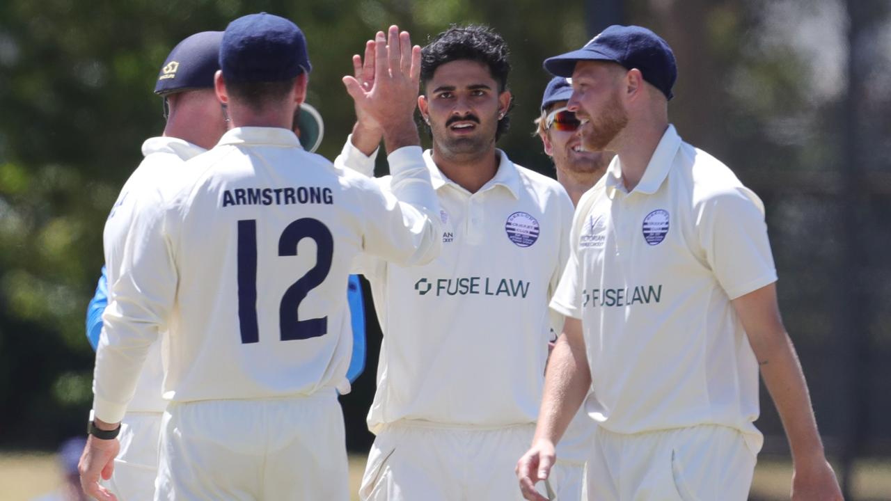 Essex recruit Jamie Porter celebrates a wicket with his Geelong teammates. Picture: Mark Wilson