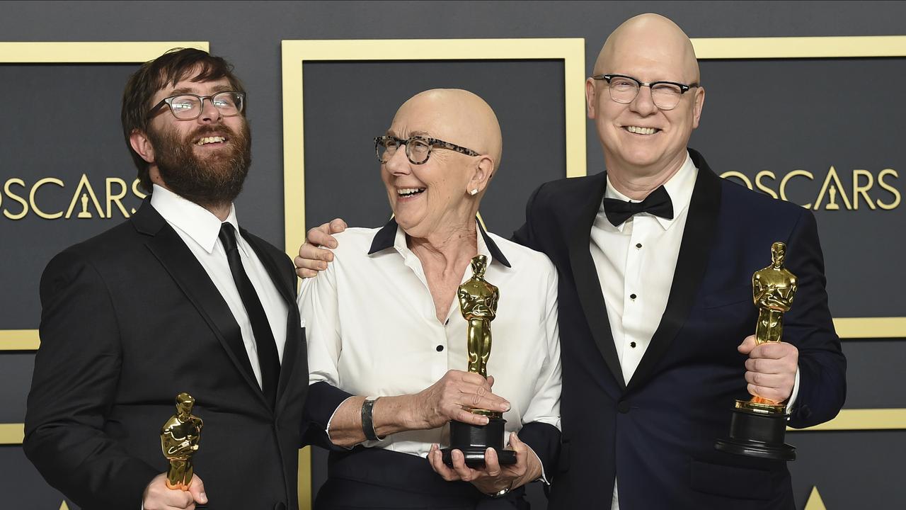 Best Documentary Feature: <i>American Factory</i>. Pictured from left; Jeff Reichert, Julia Reichert, and Steven Bognar accept the award. Picture: AP