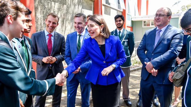 NSW Premier Gladys Berejiklian and Education Minister Rob Stokes congratulating Randwick Boys High School Year 12 students. Picture: AAP Image/Brendan Esposito