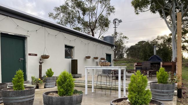 Outside the Hatherleigh stone barn as retired army officer David Smith and his artist wife Selena convert their 120 year old barn into a brewery and art studio space. Picture: Supplied