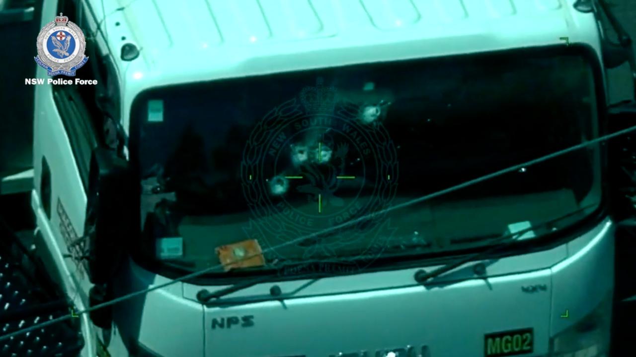 Four holes in the truck’s windscreen were not caused by live rounds, but the result of other “tactical options”, police said. Image supplied by NSW Police Force.