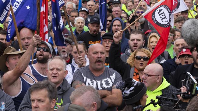 Shaun Reardon (centre) among thousands of protesters at the Change the Rules rally in Melbourne, 2019. Picture: Daniel Pockett