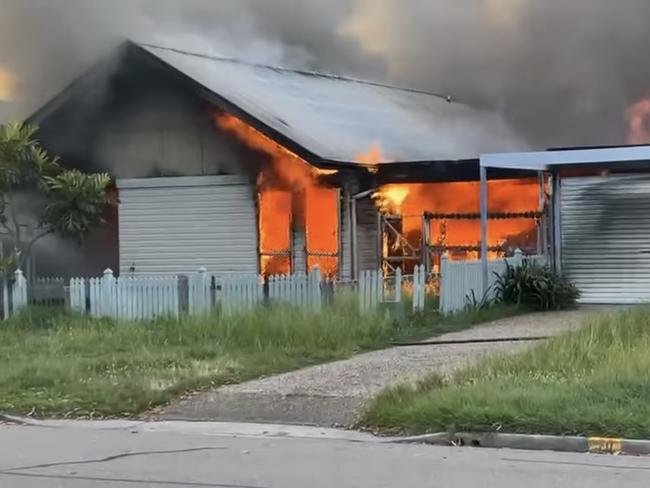 Fireys battle blaze as two dwellings go up in flames