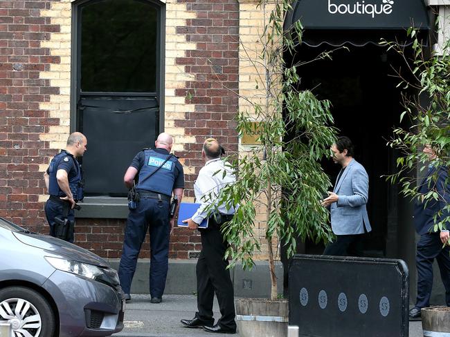 Police inspect the front of Boutique nightclub. Picture: Tim Carrafa