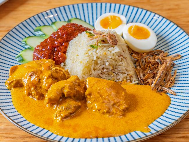 Little Borneo's fresh and flavoursome Nasi Lemak is a beautifully presented rice dish which features a range of traditional elements including egg, ikan bilis (dried anchovies), and slices of cucumber. Picture: Supplied