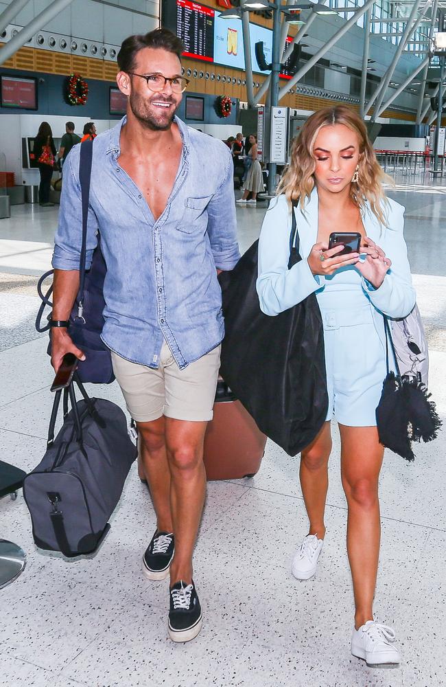 Still together! Bachelorette Angie Kent and series winner Carlin Sterritt at Sydney Airport last week. Picture: Matrix Media Group