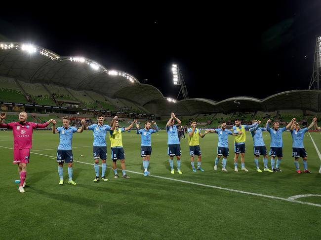 MELBOURNE, AUSTRALIA - JANUARY 24: Sydney players celebrate their win with fans during the round 16 A-League match between the Melbourne Victory and Sydney FC at AAMI Park on January 24, 2020 in Melbourne, Australia. (Photo by Jonathan DiMaggio/Getty Images)