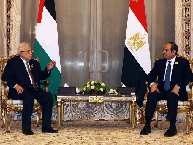 Palestinian Authority President Mahmud Abbas (L) meeting with Egypt's President Abdel Fattah al-Sisi during the Arab League Summit on Gaza, in Cairo. Picture: PPO/AFP