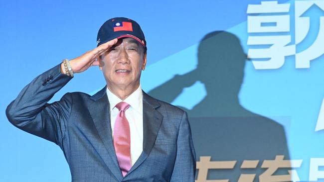 Terry Gou salutes launches his campaign in Taipei on Monday. Picture: AFP