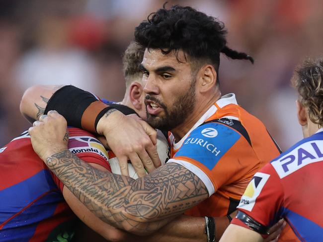 NEWCASTLE, AUSTRALIA - APRIL 13: Terrell May of the Tigers hits up the ball during the round six NRL match between Newcastle Knights and Wests Tigers at McDonald Jones Stadium, on April 13, 2025, in Newcastle, Australia. (Photo by Scott Gardiner/Getty Images)