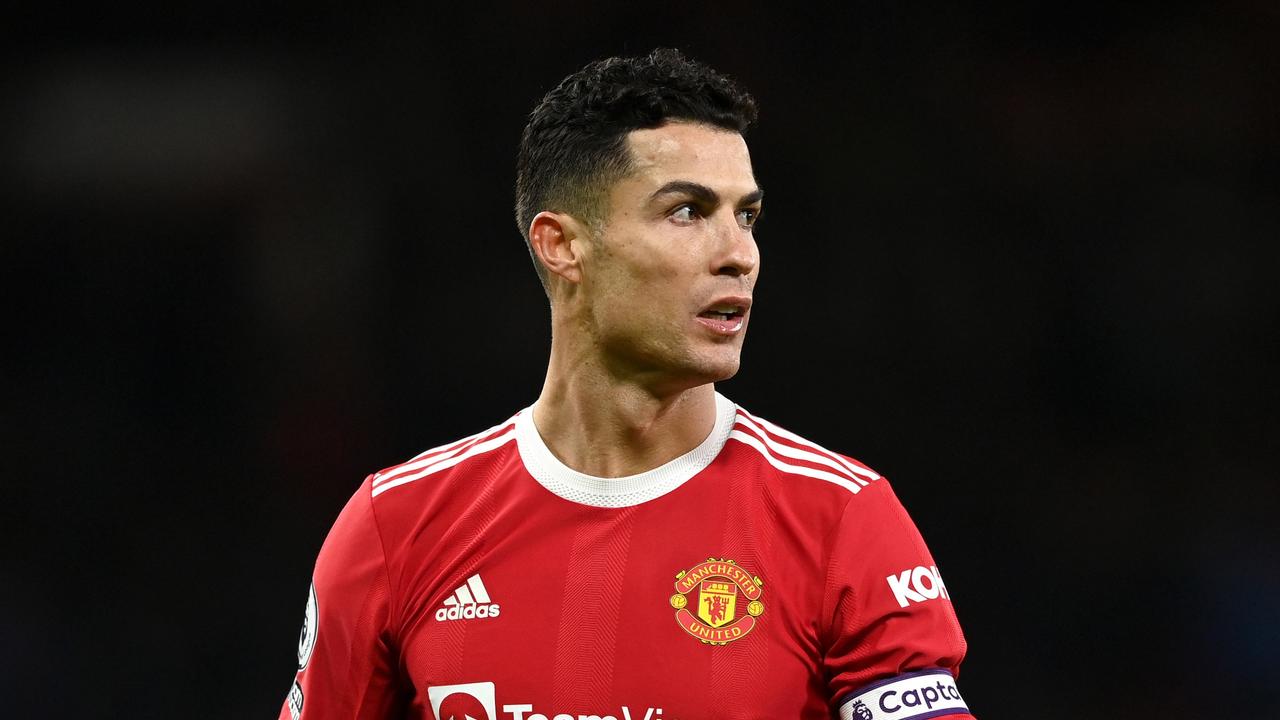 MANCHESTER, ENGLAND - JANUARY 03: Cristiano Ronaldo of Manchester United reacts wearing the captains armband during the Premier League match between Manchester United and Wolverhampton Wanderers at Old Trafford on January 03, 2022 in Manchester, England. (Photo by Gareth Copley/Getty Images)