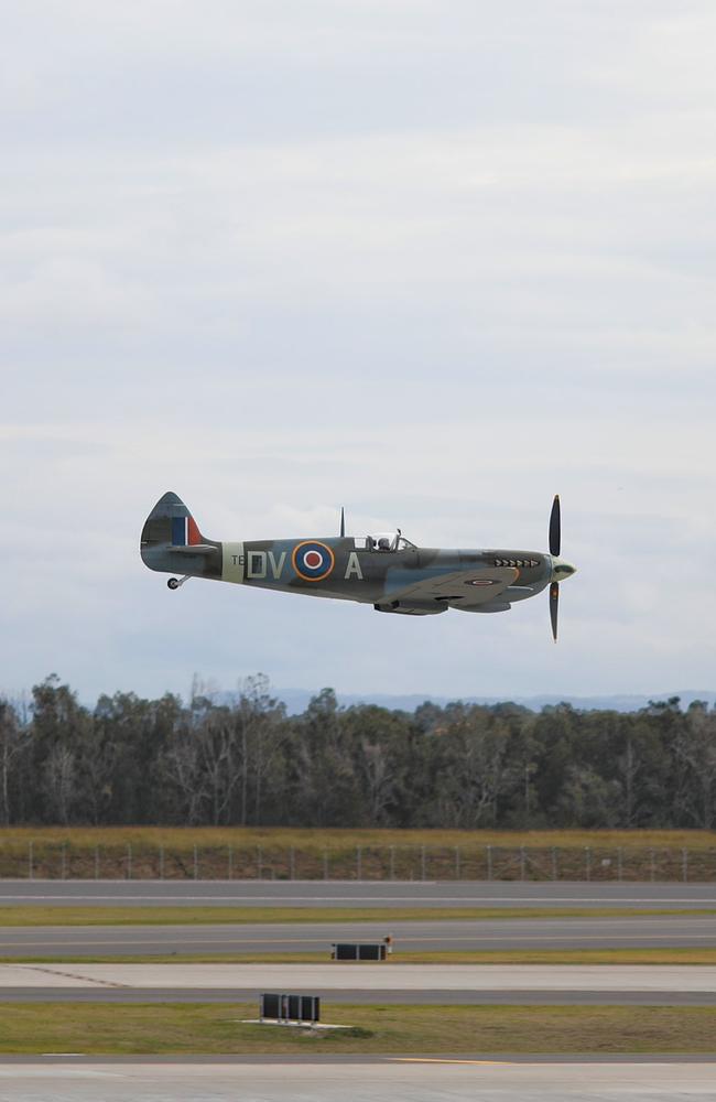 A Supermarine Spitfire flies over the new runway. Picture: Kate Jones