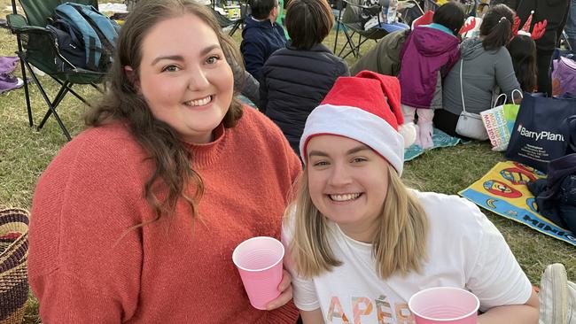 Eltham's Lani Daicos and Chili Mitchell had a great time at Manningham's 2022 Carols at Ruffey Lake Park in Doncaster.