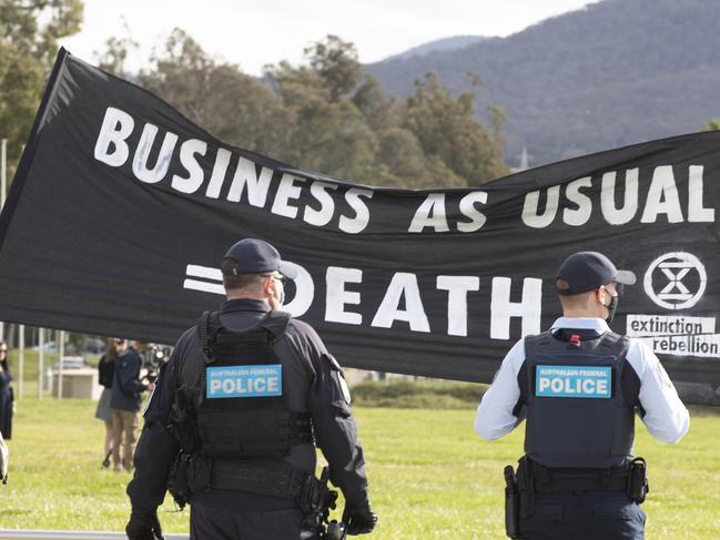 CANBERRA, AUSTRALIA - NewsWire Photos OCTOBER 21, 2021: Extinction Rebellion protesters with prams  at Parliament House in Canberra in the the last sitting week before the COP26, international climate talks in Glasgow. Picture: NCA NewsWire / Gary Ramage