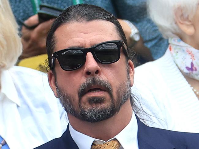 LONDON, ENGLAND - JULY 02: Musician, Dave Grohl, and his wife Jordyn Grohl are seen in the Royal Box ahead of the Ladies' Singles first round match between Jessica Bouzas Maneiro of Spain and VONduring day two of The Championships Wimbledon 2024 at All England Lawn Tennis and Croquet Club on July 02, 2024 in London, England. (Photo by Sean M. Haffey/Getty Images)