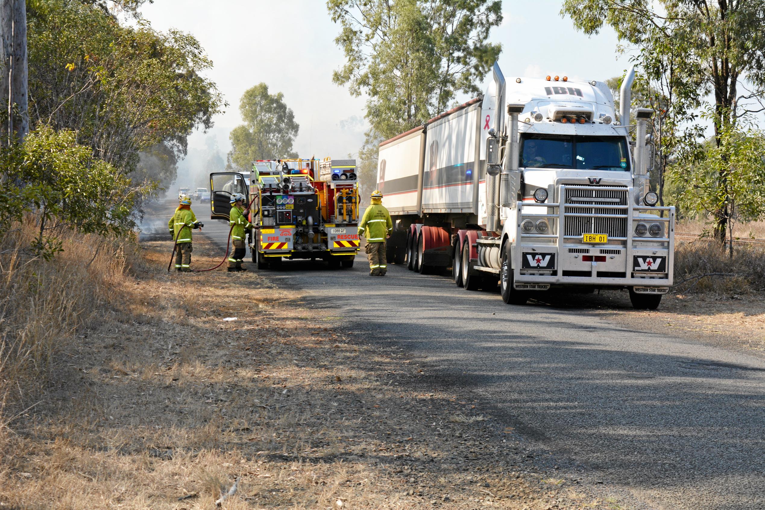 Crews are battling a grass fire which started at Philps road, Grantham. September 13, 2018. Picture: MEG BOLTON