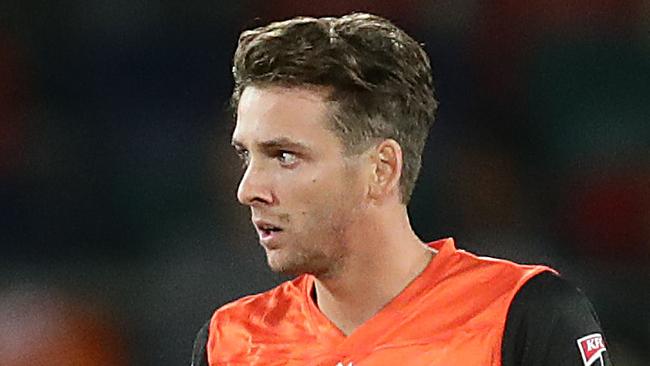 CANBERRA, AUSTRALIA - JANUARY 16: Jhye Richardson of the Scorchers celebrates taking the wicket of Josh Philippe of the Sixers during the Big Bash League match between the Sydney Sixers and the Perth Scorchers at Manuka Oval, on January 16, 2021, in Canberra, Australia. (Photo by Mark Metcalfe/Getty Images)