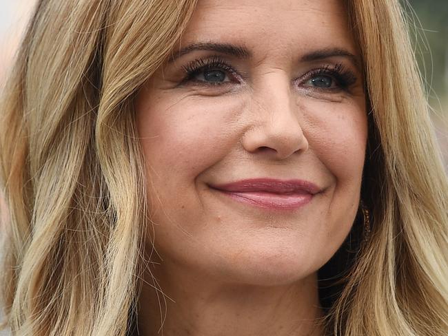 (FILES) In this file photo taken on May 15, 2018 US actress Kelly Preston poses during a photocall for the film "Gotti" at the 71st edition of the Cannes Film Festival in Cannes, southern France. - Kelly Preston, US actress and wife of US actor John Travolta, died after a battle with breast cancer at the age of 57, US media reported. (Photo by Anne-Christine POUJOULAT / AFP)