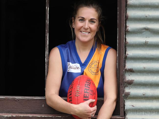 5.6.2019.Casey McElroy, 27, on the family farm at Marcollat with her dad Bradley,52 and grandfather Jeffrey,81.Casey  played in the men's reserves footy team for Padthaway last month and the club has been fined $1000. PIC TAIT SCHMAAL.