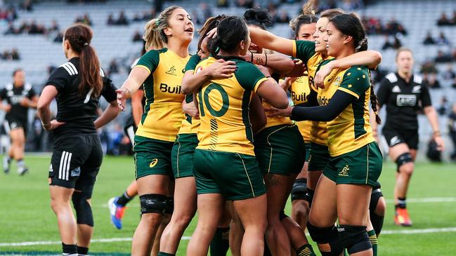 Wallaroos players celebrate the try against New Zealand at Eden Park in 2019.