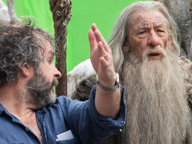 Ian McKellen as Wizard Gandalf with film director Peter Jackson on set of The Hobbit: The Battle of the Five Armies