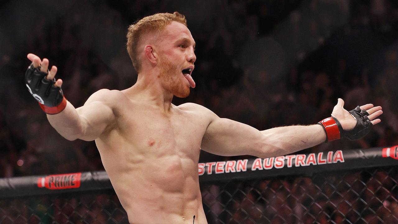 Aussie becomes champ, stuns UFC world