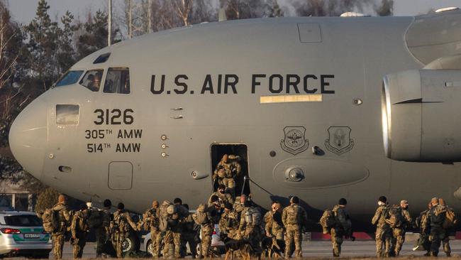 US soldiers disembark from a C-17 Globemaster cargo plane on the tarmac of Rzeszow-Jasionka Airport, south eastern Poland. Picture: AFP