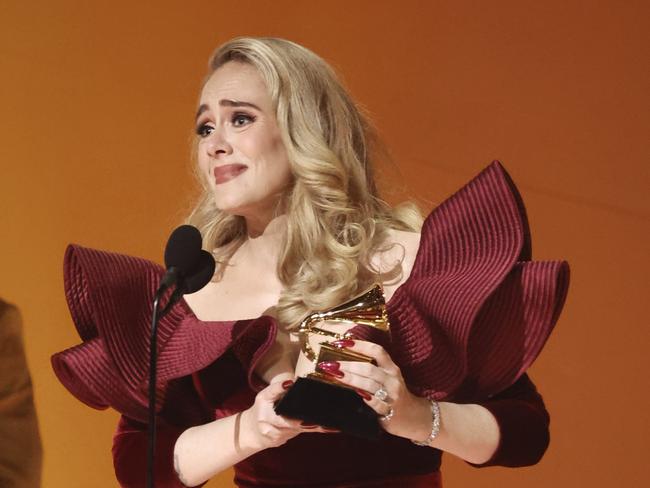 Adele accepts the Best Pop Solo Performance award. Picture: Getty Images