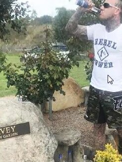 Rymer at the grave of slain Rebels bikie Michael ‘Ruthless’ Davey.