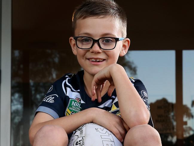 Sebastian Rennie 7 is a keen NRL fan and natural maths whiz which has helped him to reach the top 4000 players of NRL Supercoach this year out of 140,000 players. Pictured at his Baulkham Hills home. Picture: Toby Zerna