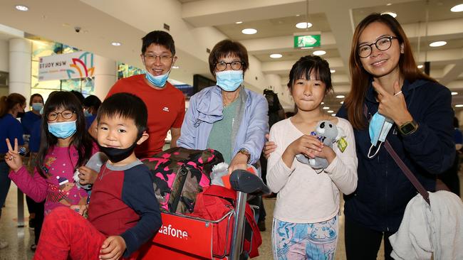 The Lim family from Singapore arrives at Sydney airport on Sunday. Picture: Jane Dempster