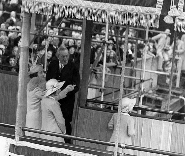 Queen Elizabeth (left) and princesses Elizabeth and Margaret with Cunard's chairman Sir Percy Bates, at the launch of the Queen Elizabeth ocean liner on September 27, 1938.