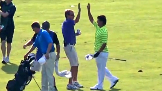 Watch the amazing video as golfer holes approach shot to win by a shot