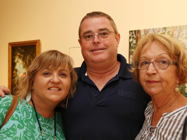 <p>Melissa, Adrian and Wendy Gover plus members of the Cairns Art Society celebrated their 69th Annual Art Exhibition at the official opening of the exhibition at the Cairns Regional Gallery. PICTURE: JUSTIN BRIERTY</p>