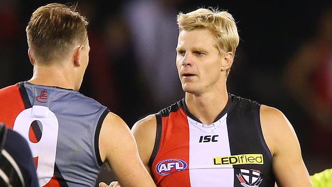 Brendon Goddard and Nick Riewoldt shake hands after a match. Picture: George Salpigtidis