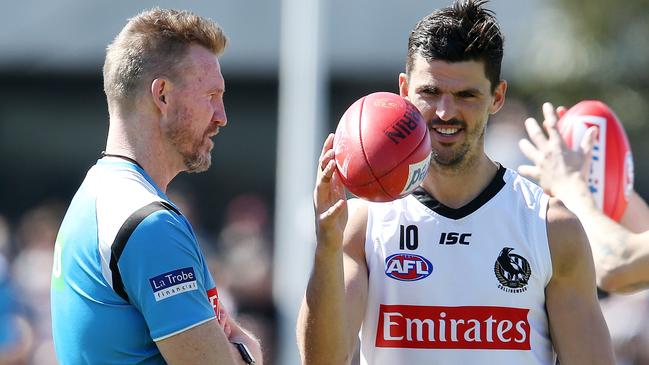 Collingwood final training session at Olympic Park. Collingwood coach Nathan Buckley chats with skipper Scott Pendlebury at training today . Pic: Michael Klein