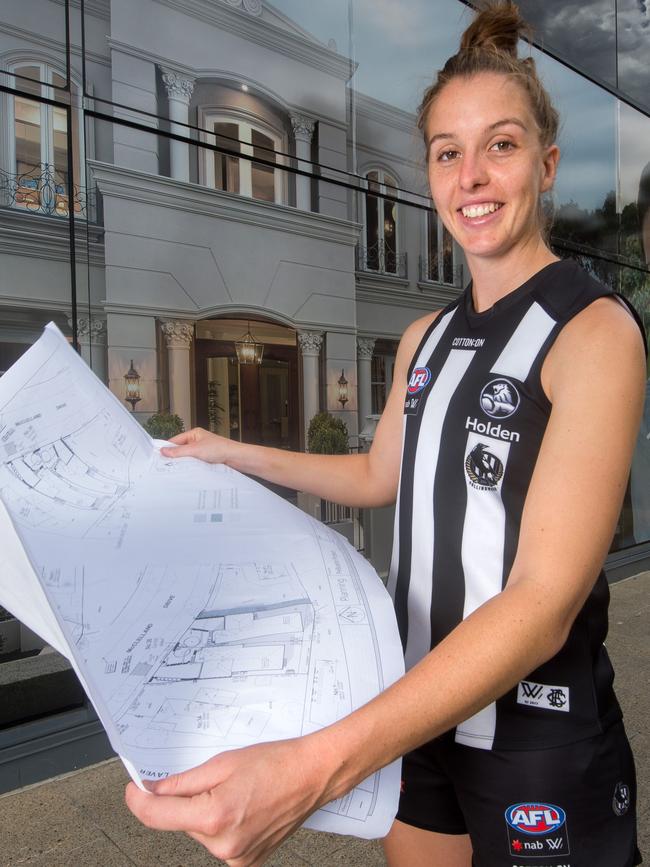 Collingwood WAFL player, Emma King, at work at Metricon Homes where she is a draftsman. Picture: Jay Town