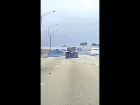 Wild moment drag racer loses control and skids across the motorway