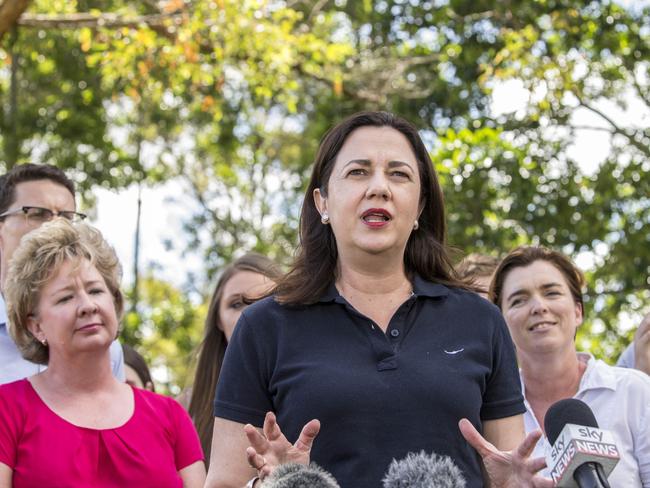 Queensland Premier Annastacia Palaszczuk with supporters at a barbecue at  Seventeen Mile Rocks the day after the election. Picture: AAP/Glenn Hunt