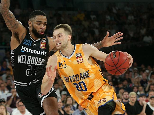 In-form Bullet Nathan Sobey drives past Shawn Long of Melbourne United.