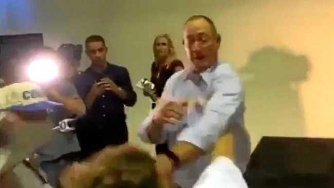 EGGING CONFRONTATION: A protester cracks an egg on Senator Fraser Anning's head during a press conference. Picture: Contributed