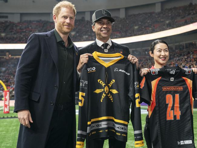 Prince Harry, Amar Doman, owner of the BC Lions, and Wenshuang Nie, a competitor in the Invictus Games, before the start of the 2024 Grey Cup. Picture: Getty Images