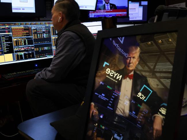 Traders work on the floor of the New York Stock Exchange at the opening bell. Picture: AFP