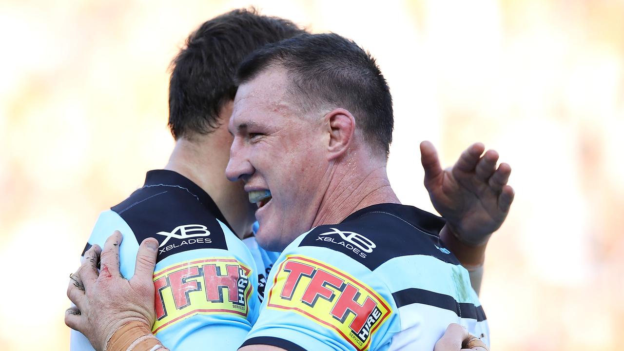 Josh Morris and Paul Gallen of the Sharks celebrate victory.