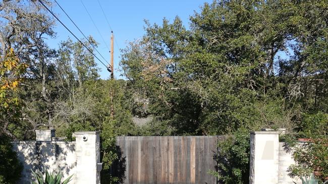 Security is also understood to stand guard inside the gated property. Picture: Backgrid