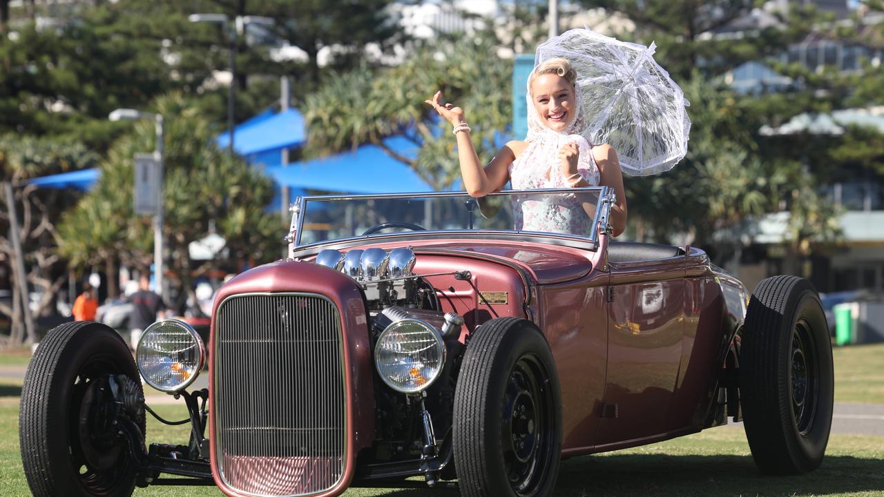 Cooly Rocks On Pin Up finalist Alice Litzow with a custom 1930 Ford Roadster Hot Rod, owned by Sam Clark. Picture: Glenn Hampson