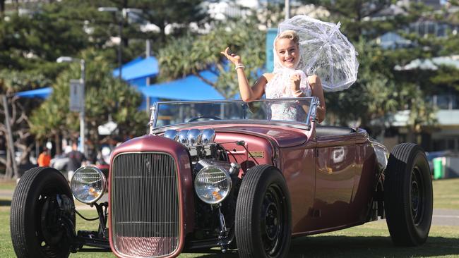 Cooly Rocks On Pin Up finalist Alice Litzow with a custom 1930 Ford Roadster Hot Rod, owned by Sam Clark. Picture: Glenn Hampson