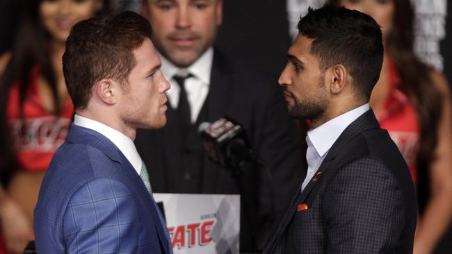 Saul 'Canelo' Alvarez and England's Amir Khan face off during their final press conference.