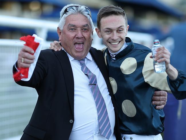 Jockey Dylan Gibbons (right) celebrates his success on Hollywood Hero last Saturday with the Bjorn Baker stable’s race day logistics manager Glen Lobb. Picture: Jeremy Ng / Getty Images